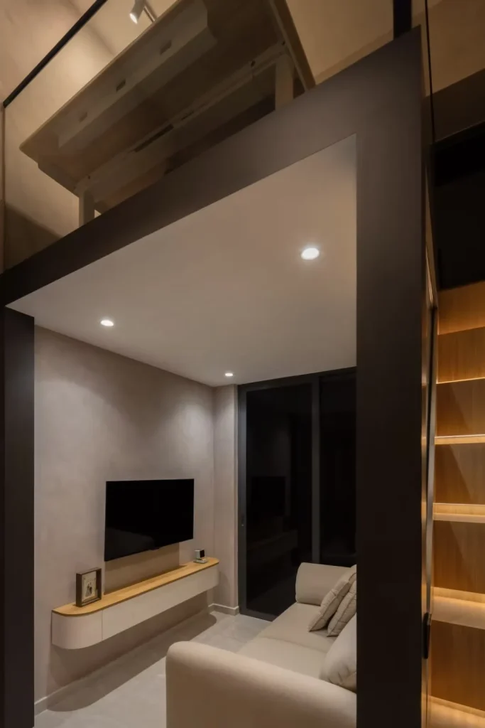 living room in Framed Loft - interior design by Twothree, Singapore