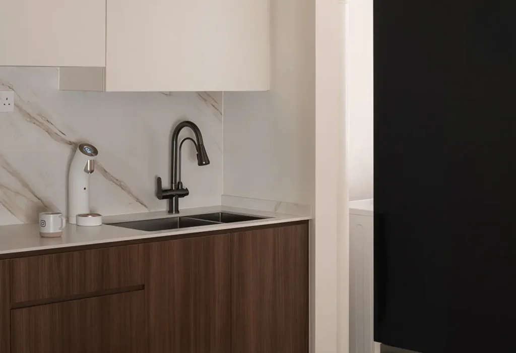 pair clean cabinetry with natural wood finishes and stone countertops. open shelving or hidden storage keeps the space clutter-free.